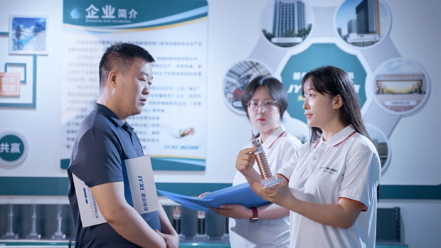 Employee explaining cable sample to customer